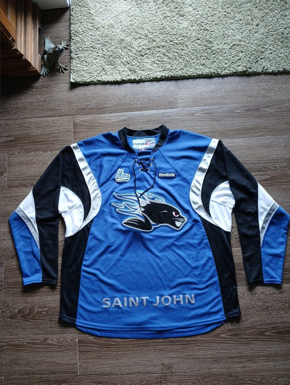Reebok Blue, Black and White Saint John Hockey Jersey with Seal Logo CHL EUC